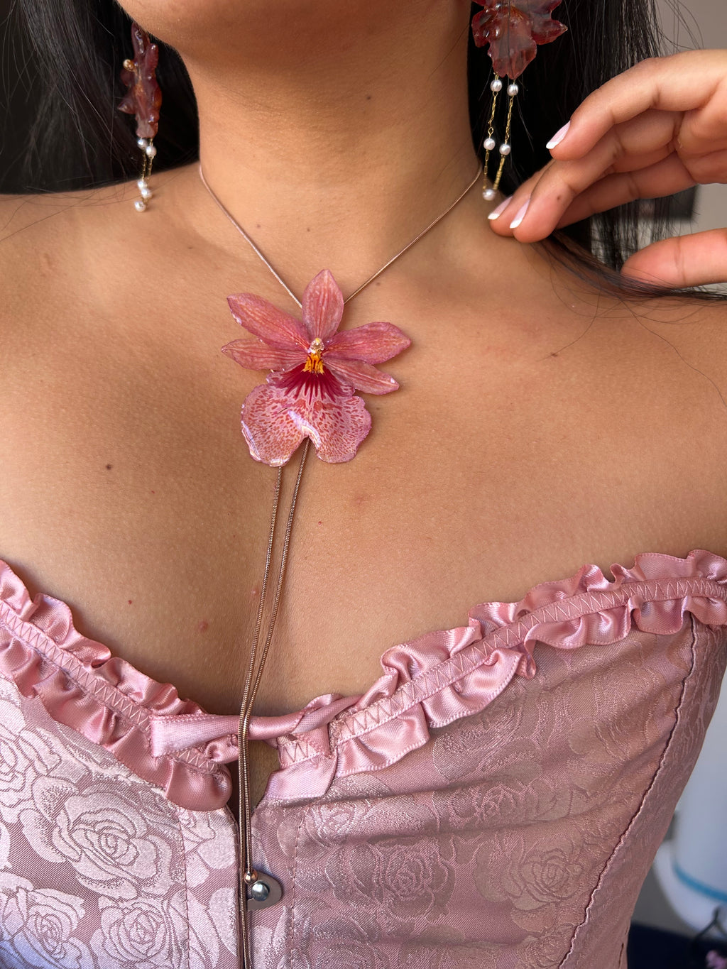 Orchid Nelly isler (cadena oro rosa)